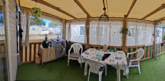 Covered veranda with dining table