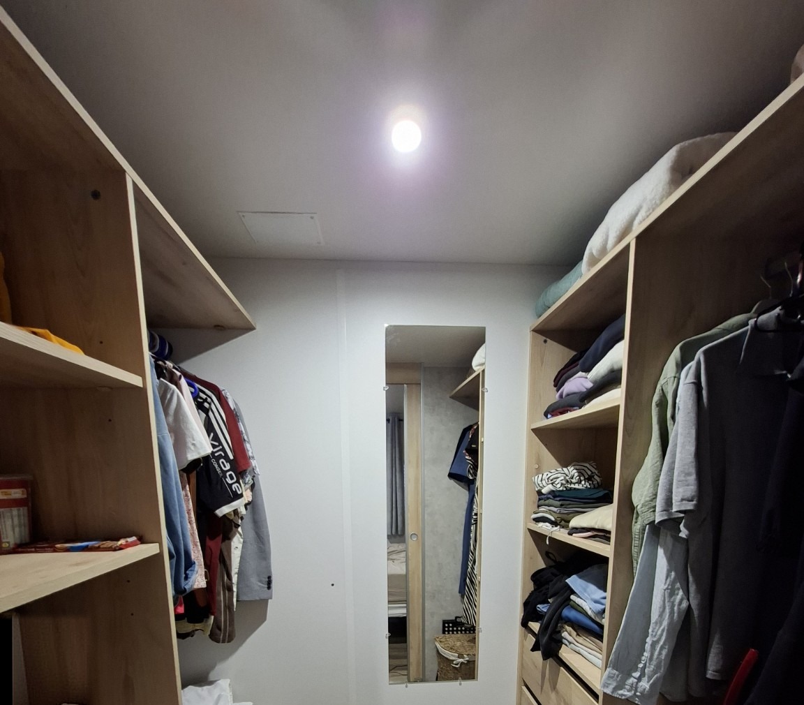 Walk-in wardrobe by the main bedroom